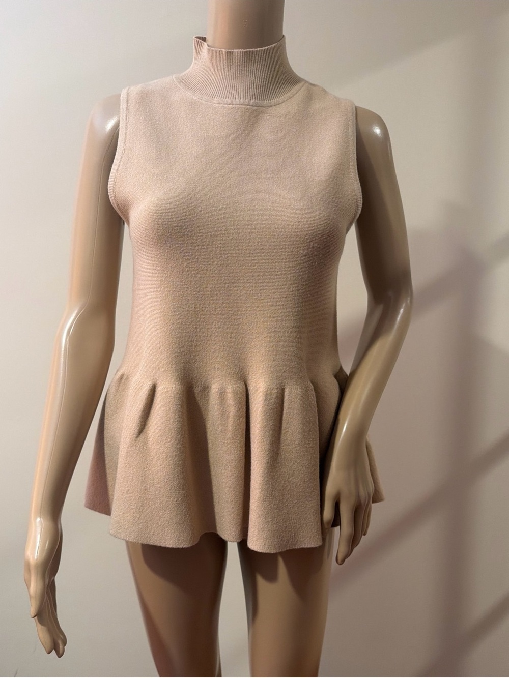 Fate Sleeveless Peplum Mock Neck Sweater in Beige Size Small